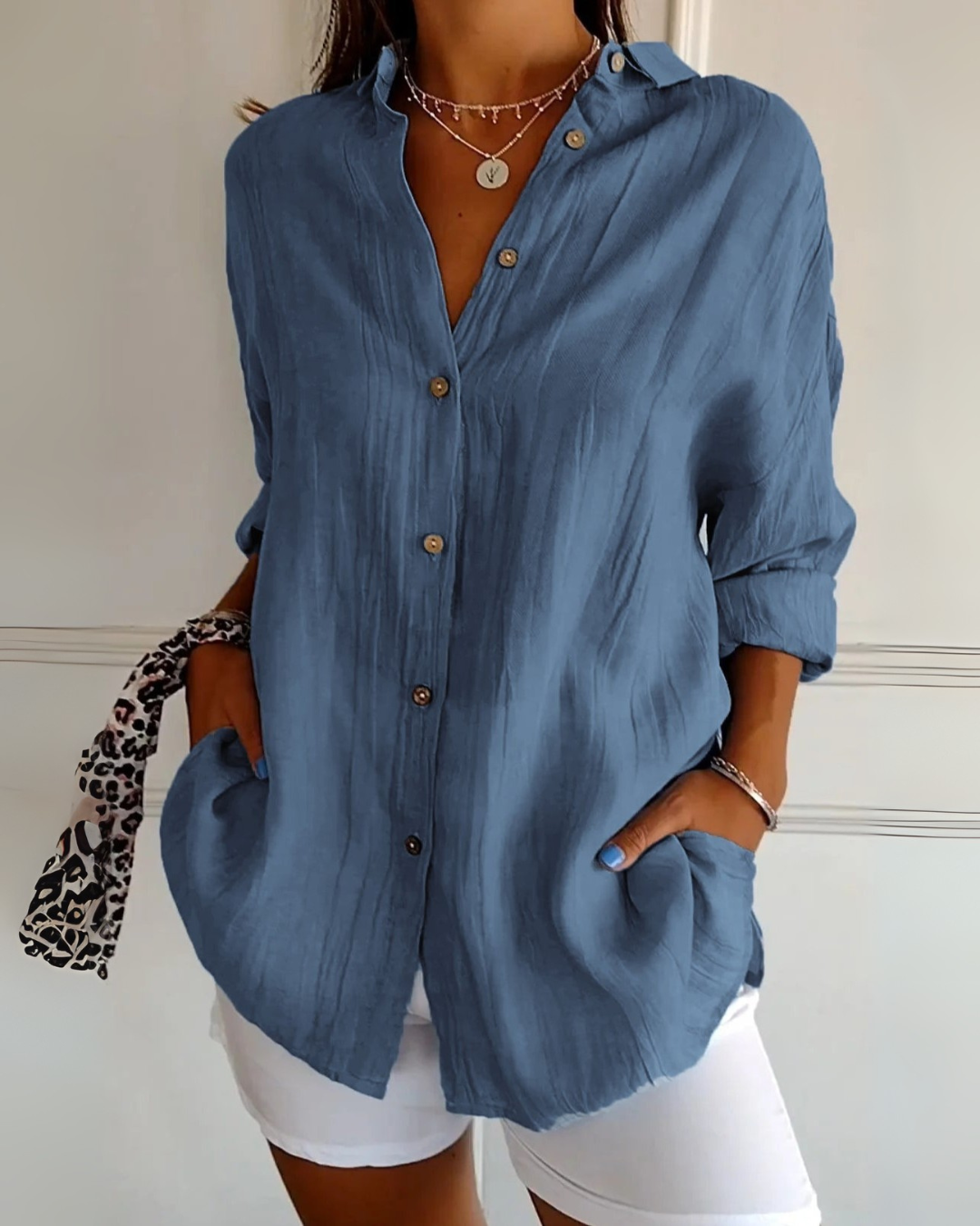 Elegant og romslig bluse med knapper