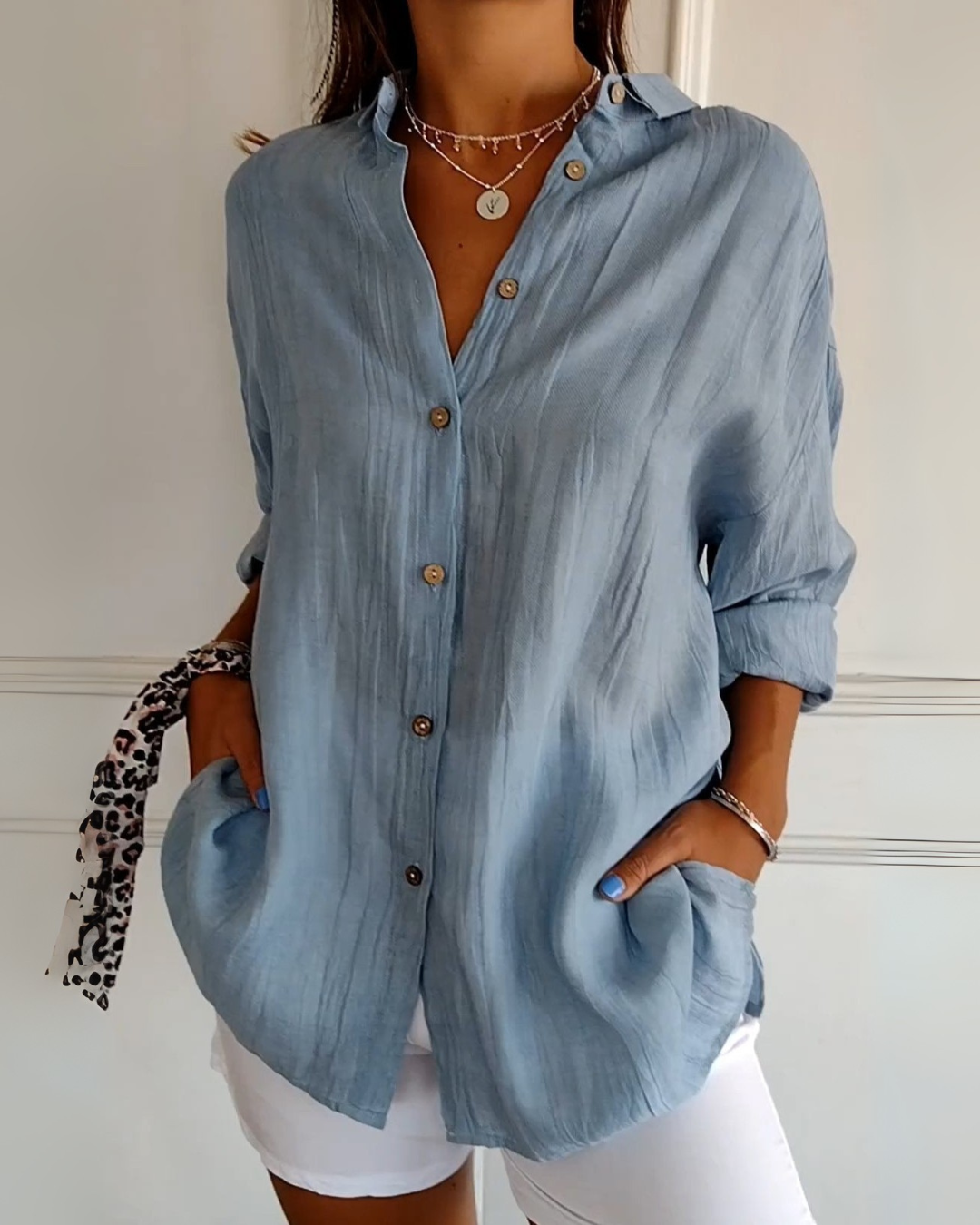 Elegant og romslig bluse med knapper