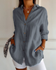 Elegant og romslig bluse med knapper