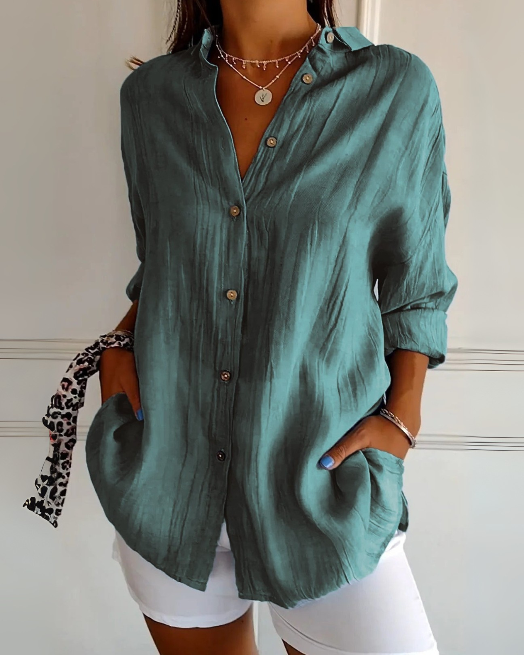 Elegant og romslig bluse med knapper