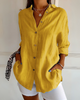 Elegant og romslig bluse med knapper